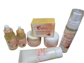 Turmeric Skincare Set showcasing soaps, creams, serum, and toner for brightening and nourishing skin.