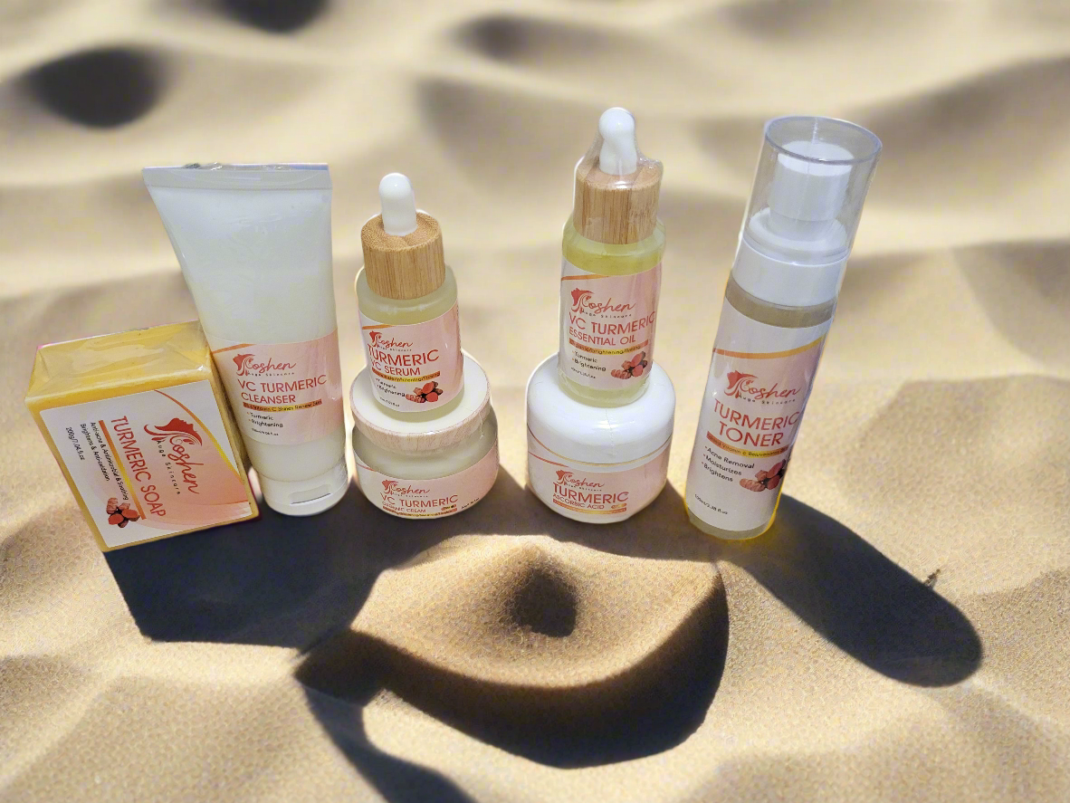 Turmeric Skincare Set showcasing cleanser, toner, and serums on a sandy background, perfect for brightening skin.