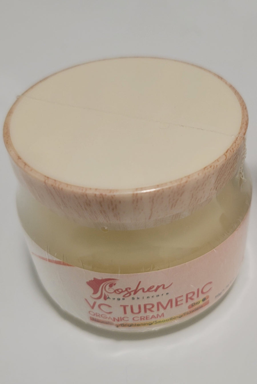 Turmeric Organic Cream in a jar from Goshen Auge Skincare, designed for brightening and healing skin.