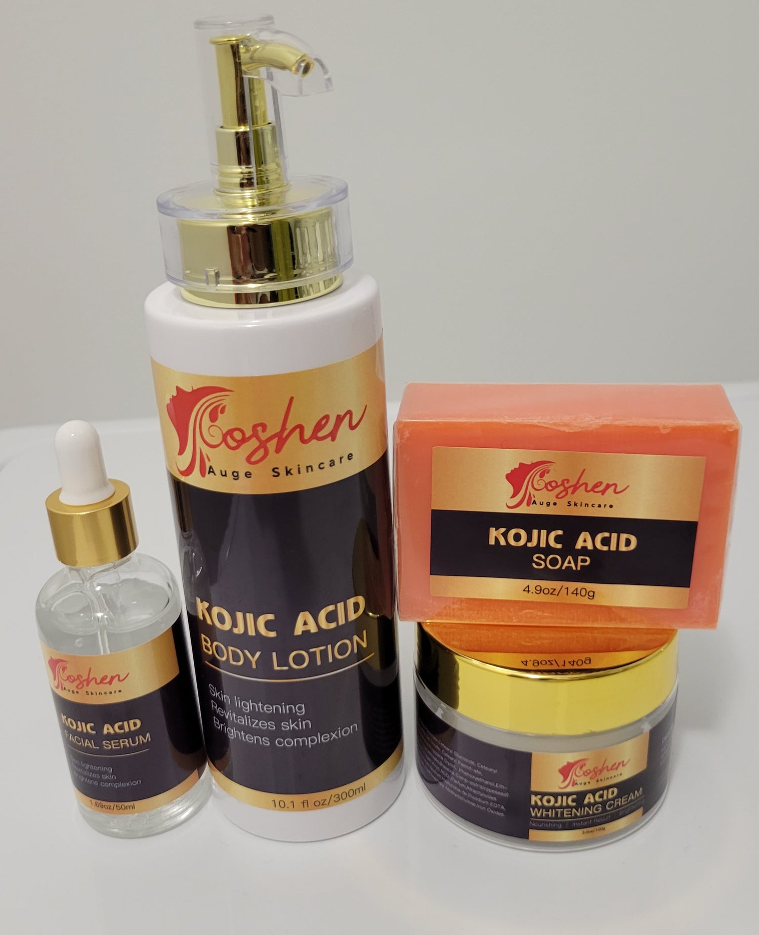 Kojic Acid Whitening Set including Kojic Acid soap, serum, and body lotion for skin brightening and dark spot removal.